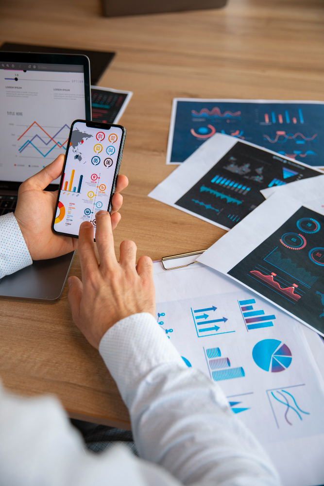 office workers using finance graphs